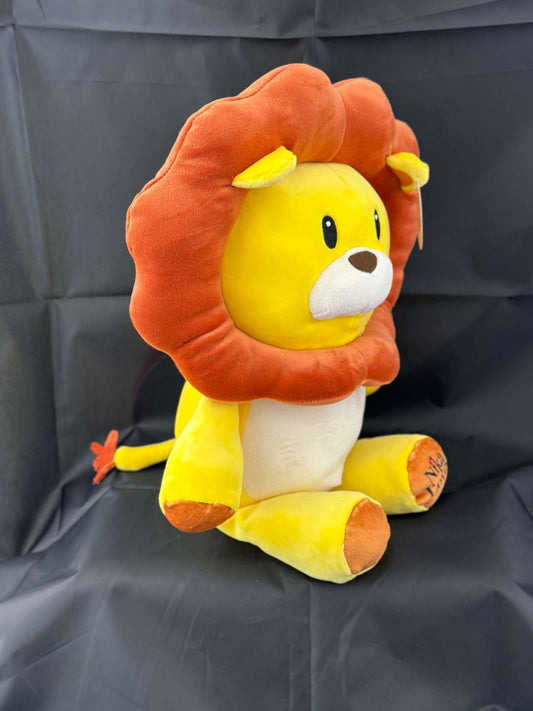 18-inch Leo the Lion plush stuffed animal with a vibrant yellow body and detailed brown mane, featured in the "Nika Loves" book series.