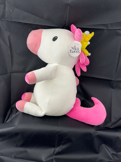 18" Princess Elena plush unicorn with pink mane and tail, wearing a golden crown, from the Nika Loves series, on a black background.