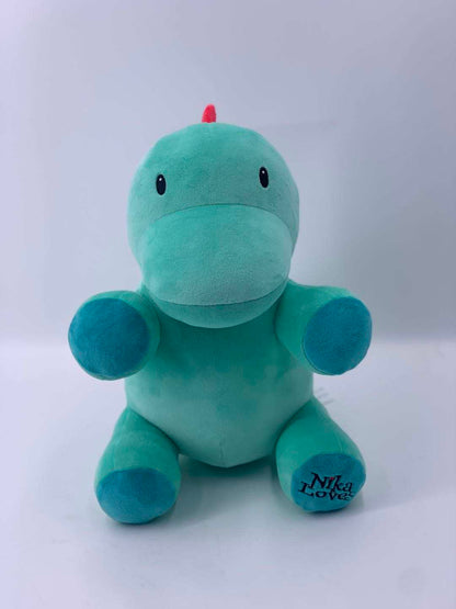 10" Genosaurus Dinosaur Plush, soft green stuffed animal with blue paws, from the Jurassic era, resembling an Ornithischian dinosaur.